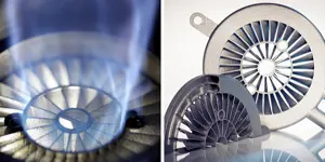 Zoomed in image of a large blue flame passing through a metal ring