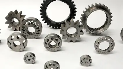 Twelve small metal component parts